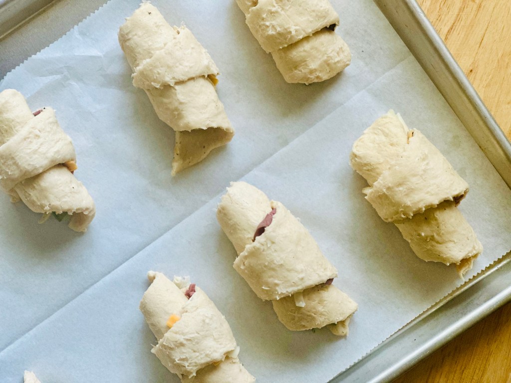 Sheet pan of unbaked croissant dough