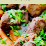 Sheet pan of roasted lamb and vegetables