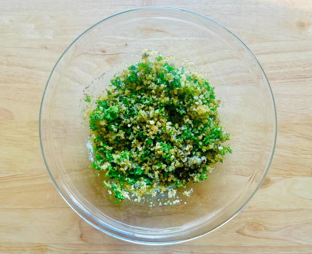 Glass bowl of panko, Parmesan, parsley, salt, and pepper