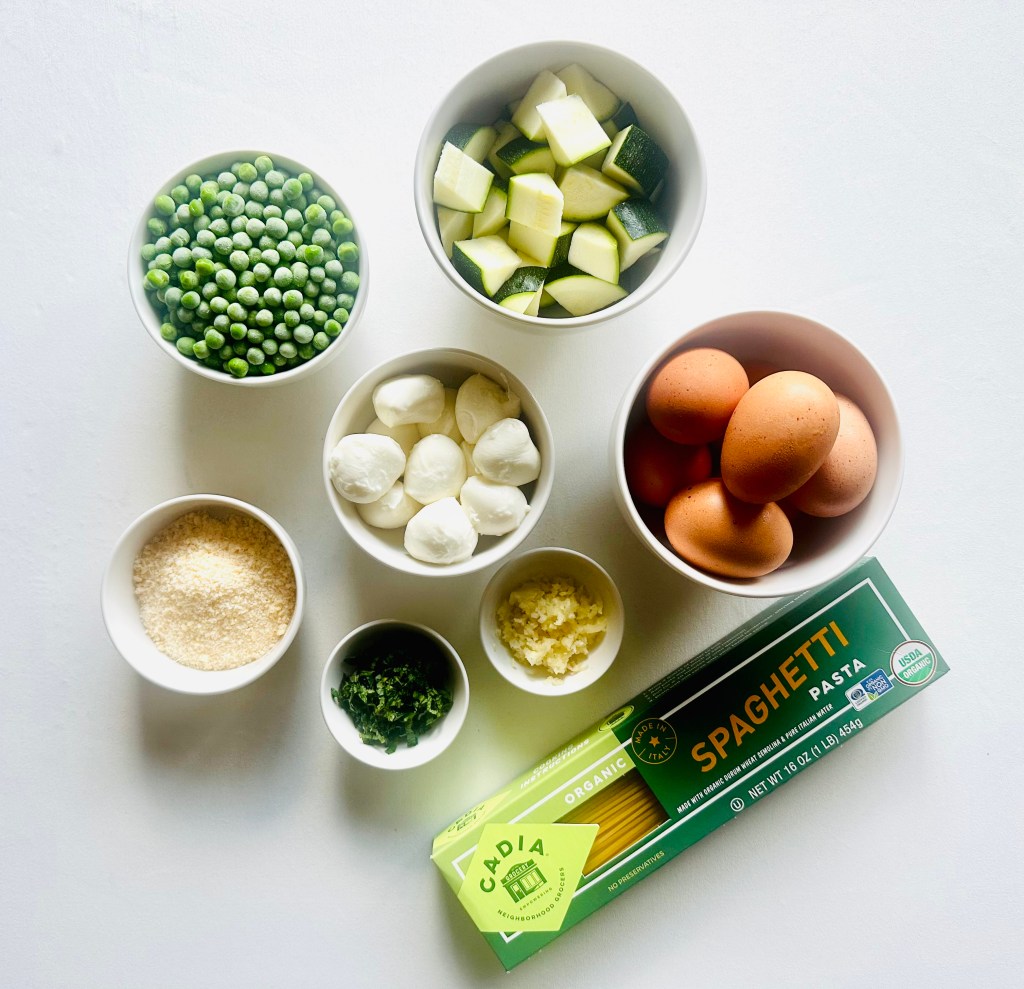 A photo of ingredients used to make spaghetti frittata