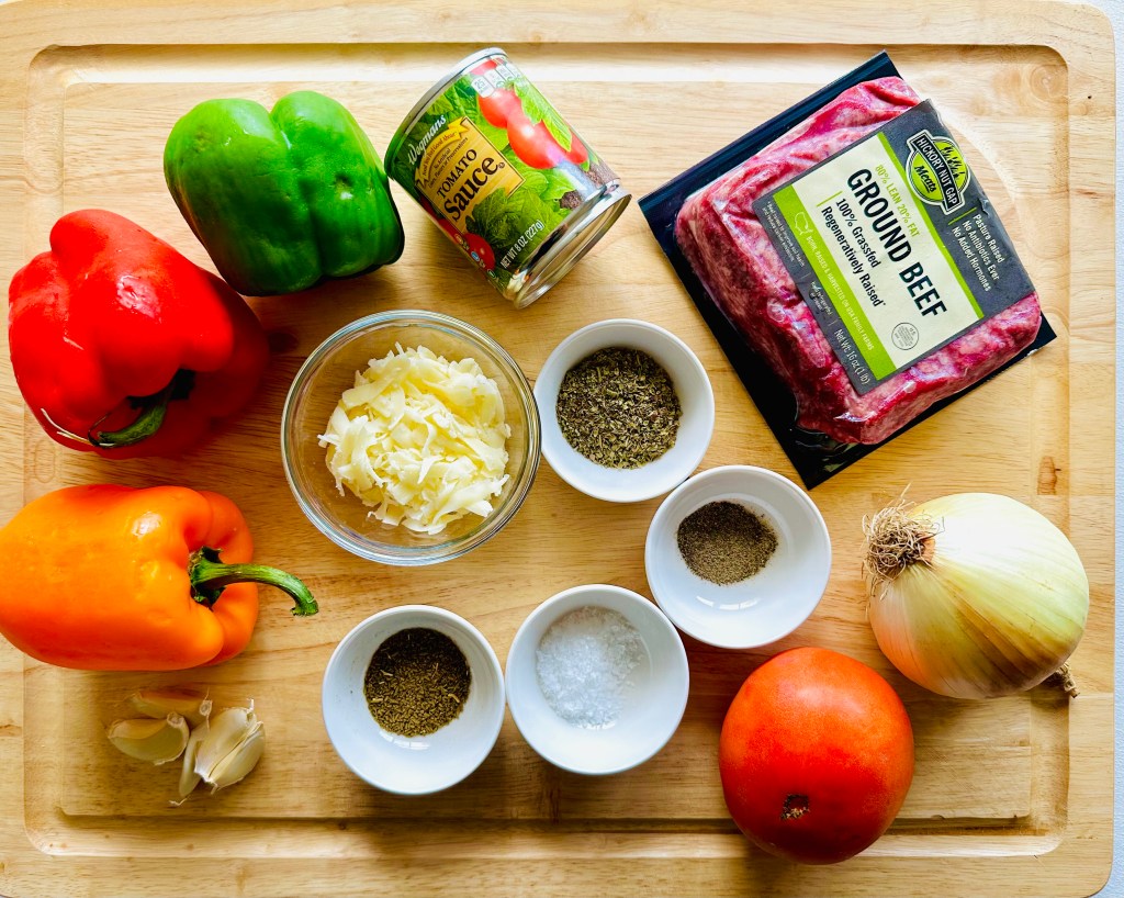 Ingredients used to make stuffed peppers with ground beef and cheese