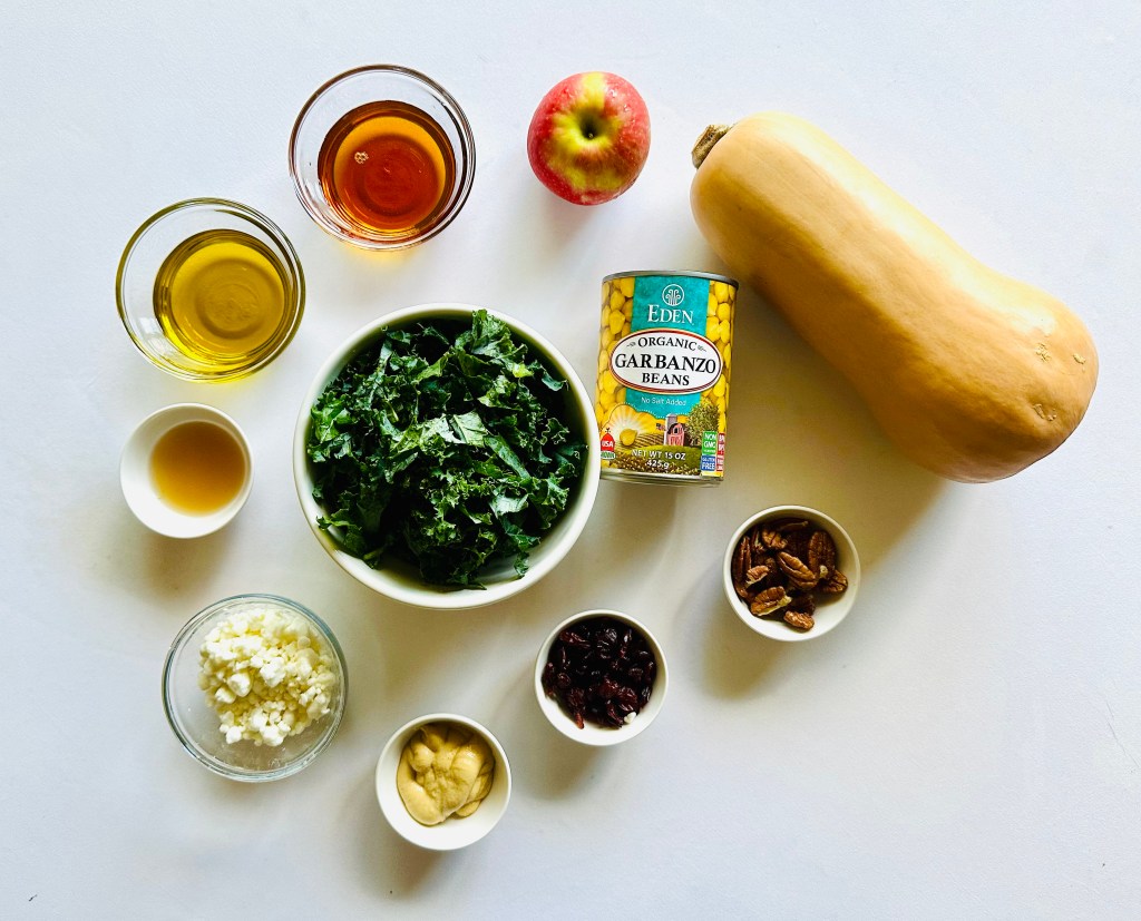 Ingredients used to make a maple-roasted butternut squash kale salad