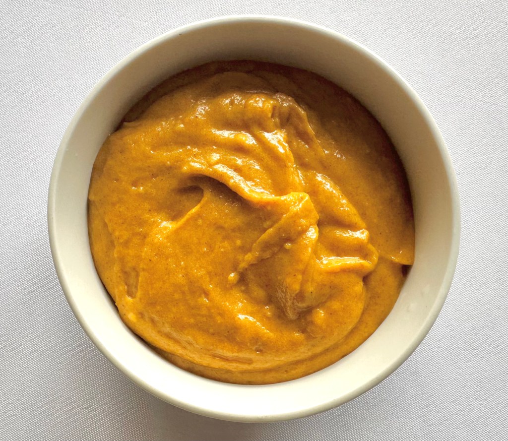 A photo of pumpkin spice cake batter