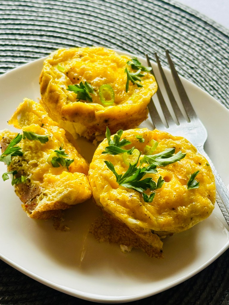 A plate full of homemade breakfast sausage egg muffins