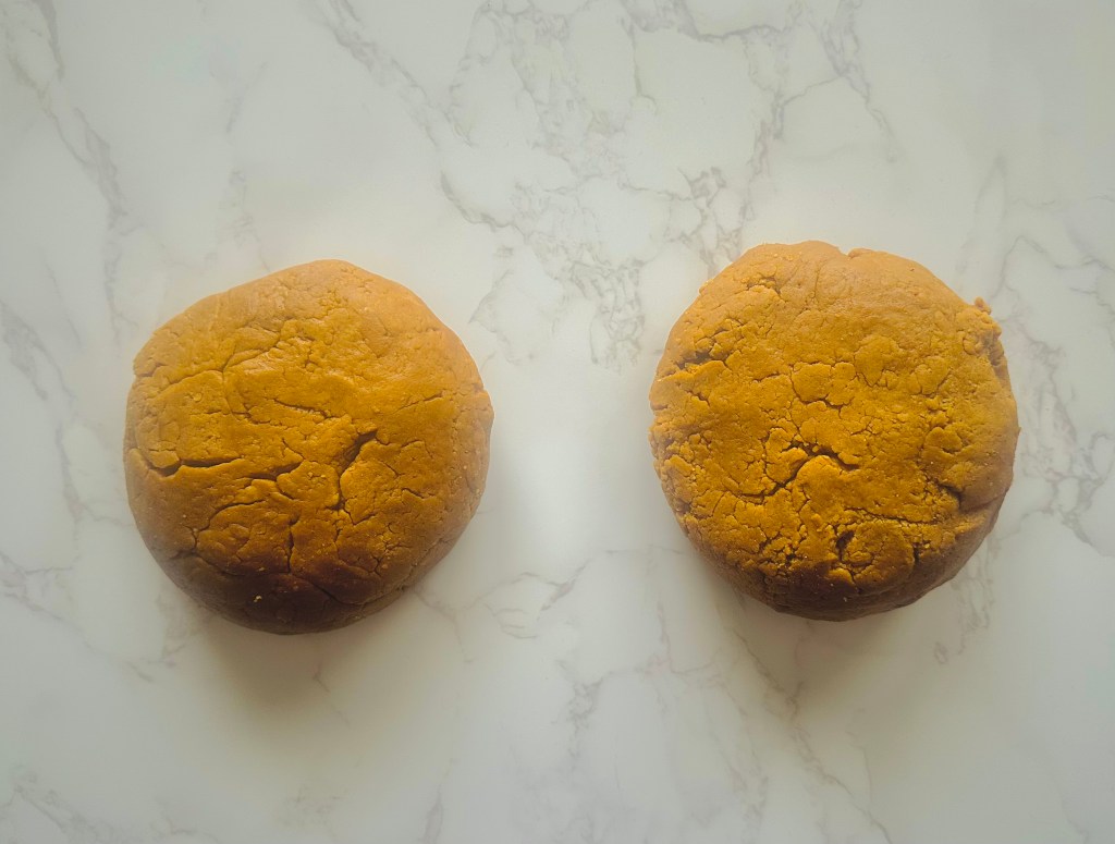 Two even discs of gingerbread dough