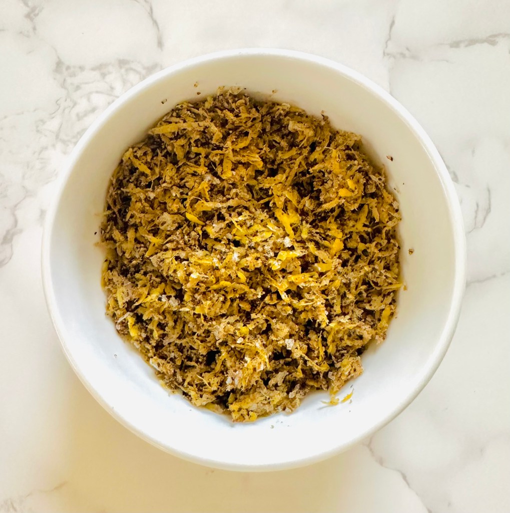A bowl of homemade lemon pepper seasoning
