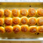 A photo of Hawaiian slider buns topped with sesame seeds