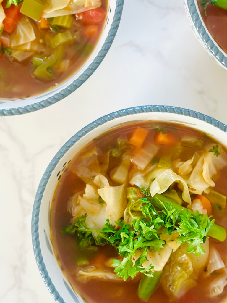 Serving bowls of homemade cabbage soup