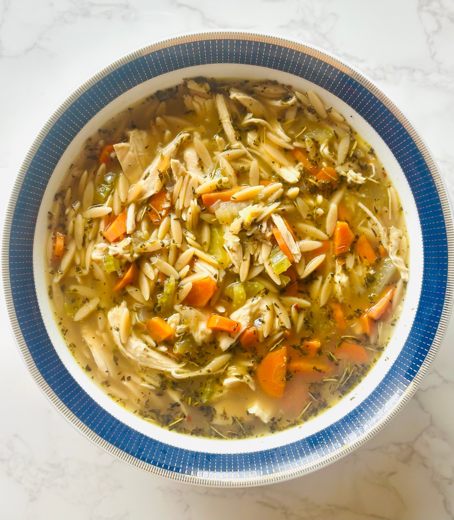A bowl of homemade chicken orzo soup
