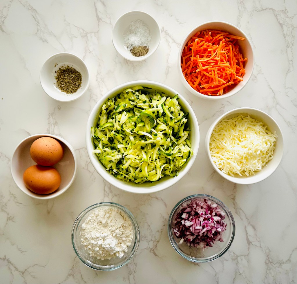 A photo of ingredients used to make crispy zucchini fritters