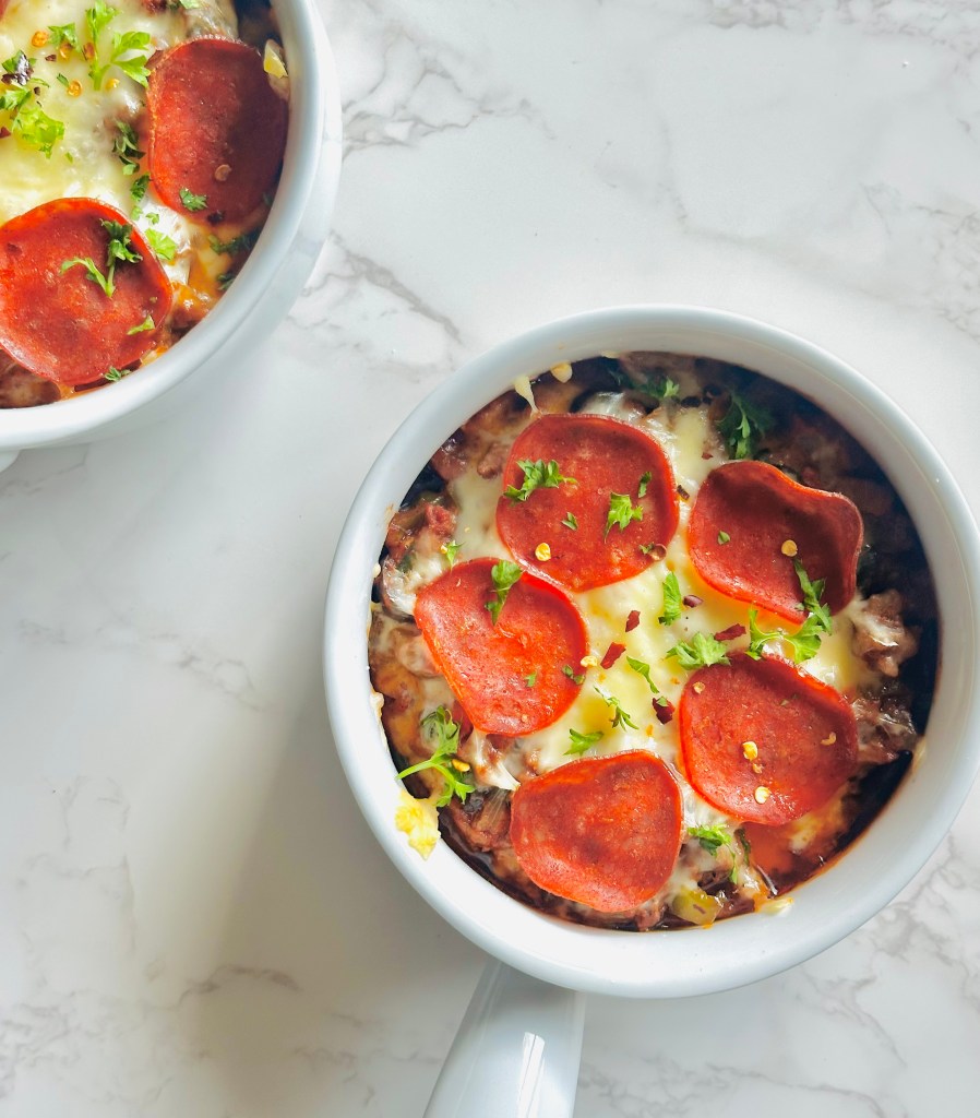 Crustless pizza bowls with topping of mozzarella and turkey pepperoni