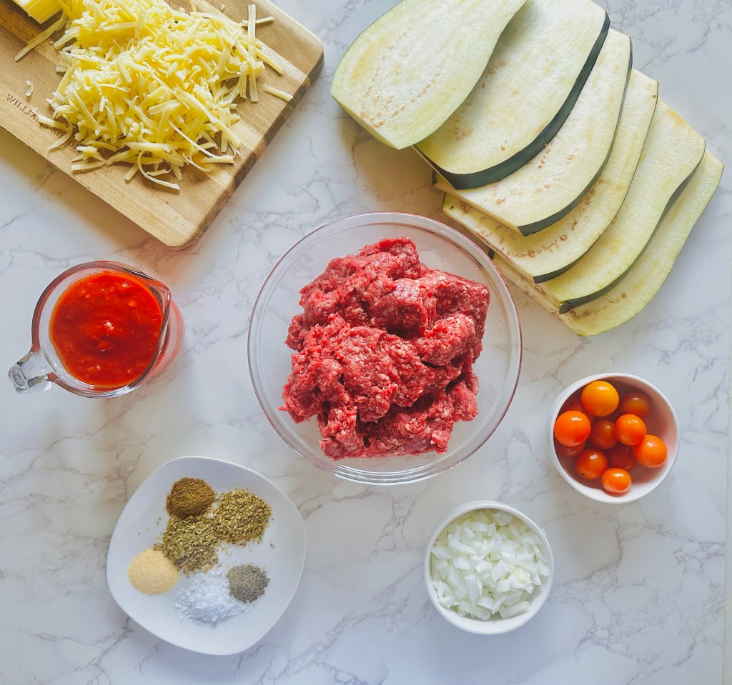 A photo of ingredients used to make eggplant casserole with ground beef
