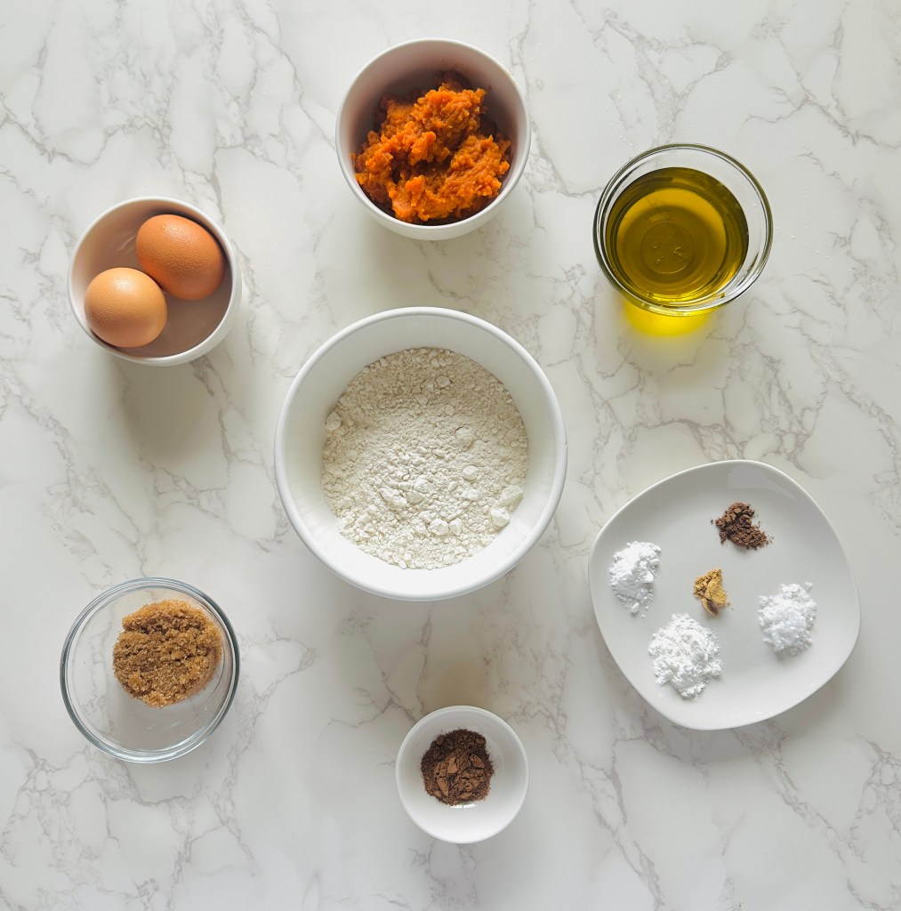 A photo of ingredients used to make homemade pumpkin cupcakes